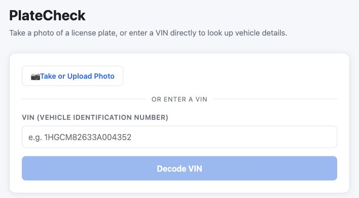 PlateCheck's vehicle lookup form, with a photo upload control and a VIN field.